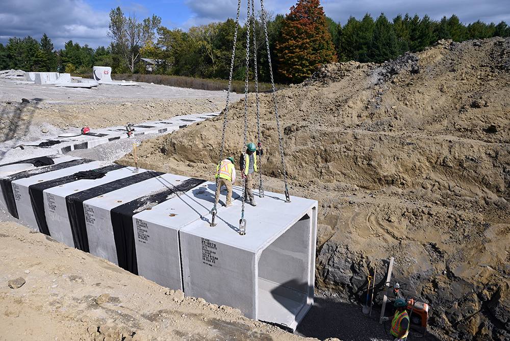 StormCrete box hanging by a crane
