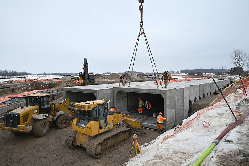 box culvert hanging from a crane