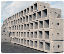 rows of stacked concrete products in the Concast yard.